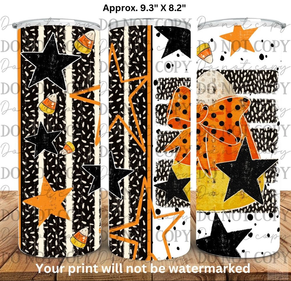 Three tall tumblers shown with a Halloween-themed printed design. The design features black stars, orange stars, candy corn motifs, and distressed black-and-white stripes.