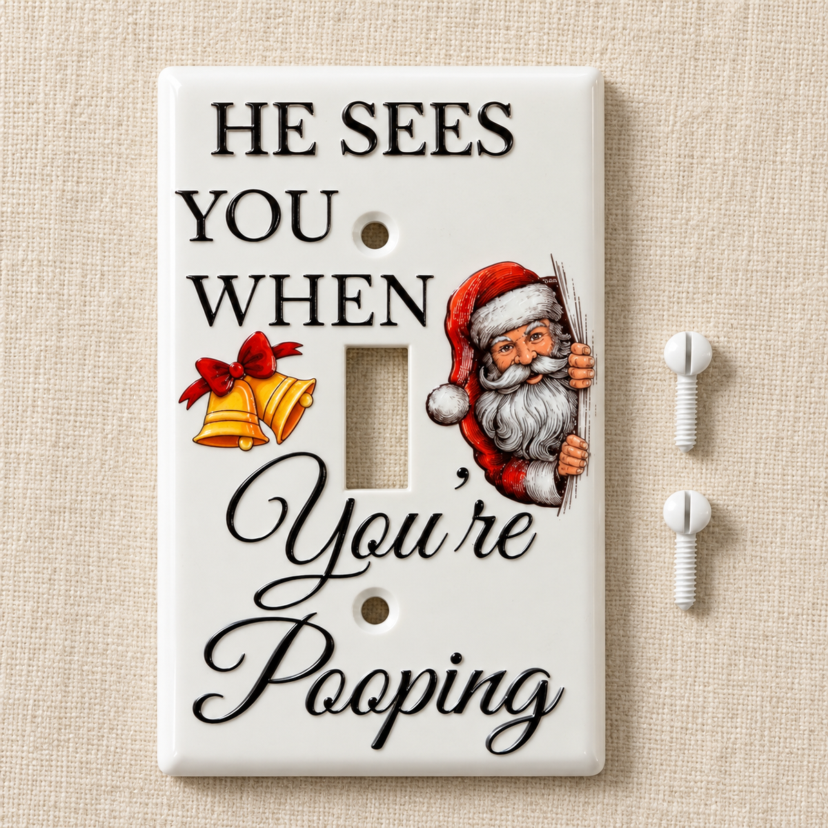 A novelty light switch plate with a Christmas design, featuring the text 'HE SEES YOU WHEN You're Pooping' alongside an illustration of Santa Claus and bells, shown on a beige textured background with two mounting screws.