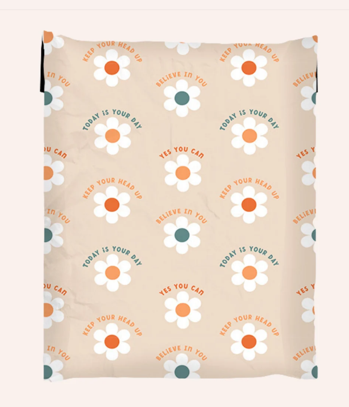 Beige polymailer with white daisies, orange and teal centers, and uplifting messages including ‘Keep Your Head Up’ and ‘Yes You Can